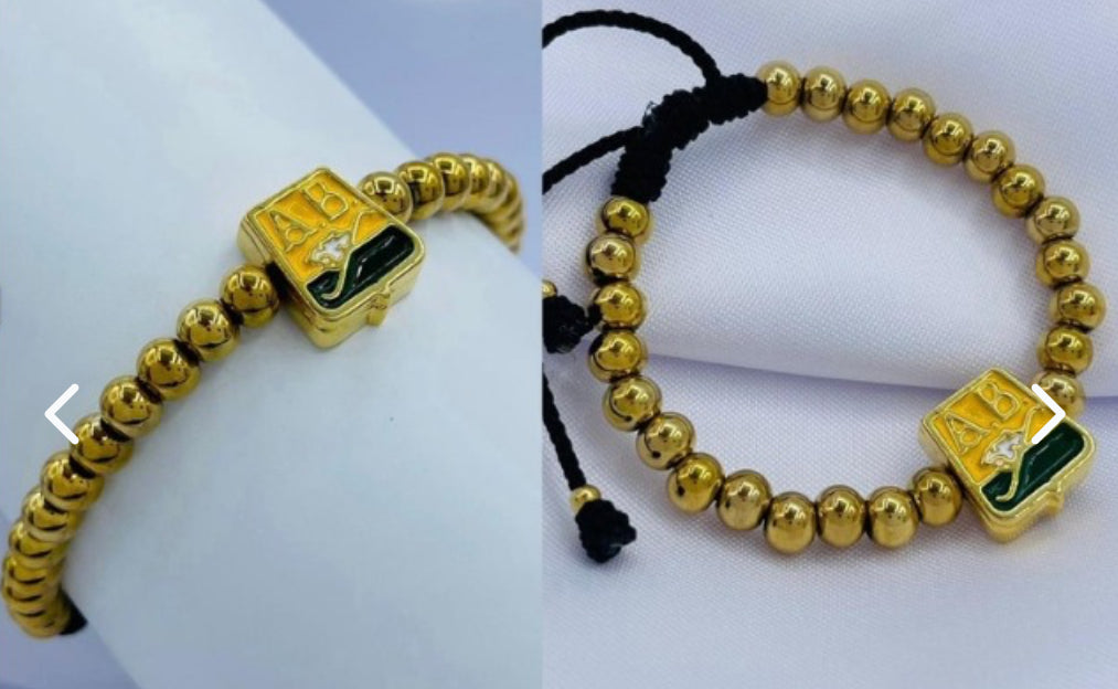 PULSERA TIPO NEOPRENO EQUIPOS DORADA